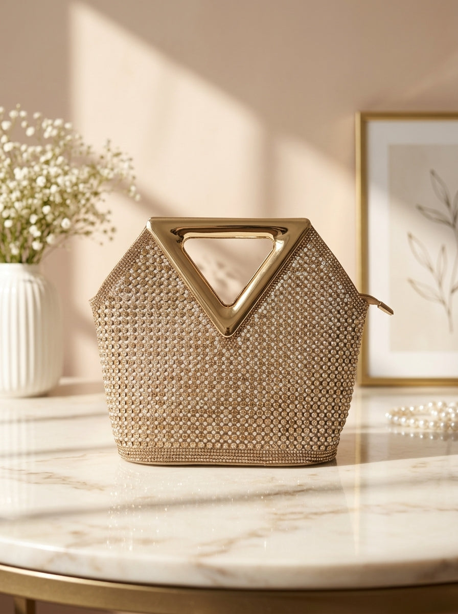 Gold-tone crystal mesh evening clutch with triangular cutout handle